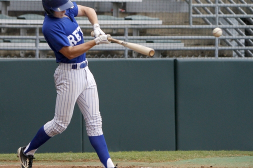 Blake Baker \'14 singles Monday, July 15, 2013 during the 12-6 victory against Refuel in the American Legion\'s Southeast Tournament at Kirsch-Rooney Stadium.