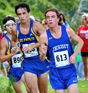 Neal Fitzpatrick races past a St. Paul's runner. 