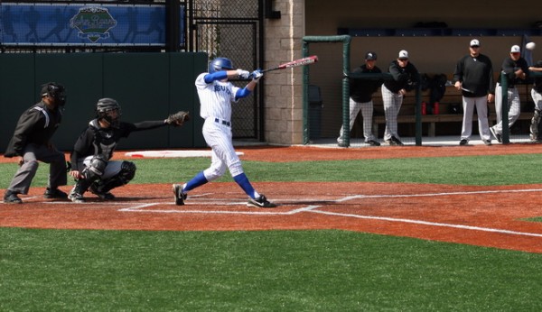 From a game earlier this season, senior Mitch Alexander (1) makes solid contact with this pitch. On Tuesday night against Holy Cross, Jesuit lit up the scoreboard with 10 runs crossing the plate and giving the Jays the win against the Tigers, 10-3.