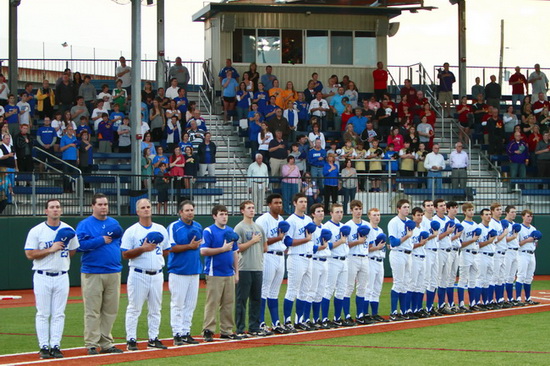 The Blue Jays stand along the first base line during the National Anthem at John Ryan Stadium. Jesuit and Acadiana will open the first round of the LHSAA playoffs this Wednesday at 6 p.m.