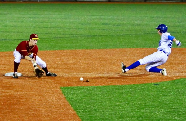 Junior Brandon Sequeira slides safely into second base in the bottom of the second inning of the Jesuit-Brother Martin rematch played Friday evening at John Ryan Stadium. 