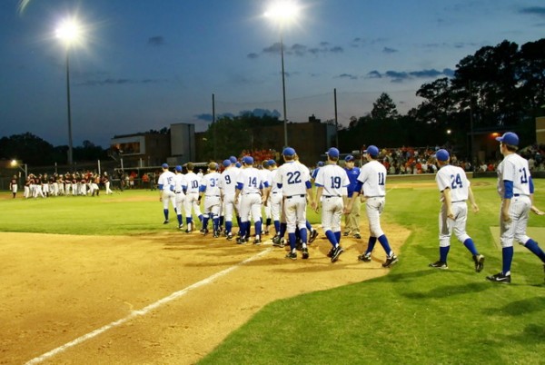 As the Catholic High Bears celebrate their 8-3 regional playoff win over Jesuit at Grizzly Field on Monday, May 6, the Jays line up to pay tribute to good sportsmanship.