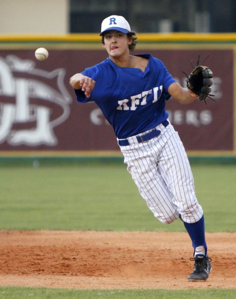 Retif Oil shortstop Alex Galy ’15 throws to first Thursday, July 18 during the 2-1 loss to Gauthier & Amedee (Dutchtown) in the American Legion’s Southeast Regional Tournament championship game at Kirsch-Rooney Stadium. 