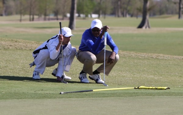 Freshman Grant Glorioso (left) and junior C.J. Blagrove led a team of five golfers against district rival Bro. Martin on Tuesday, March 26 at Lakewood Golf Club. 