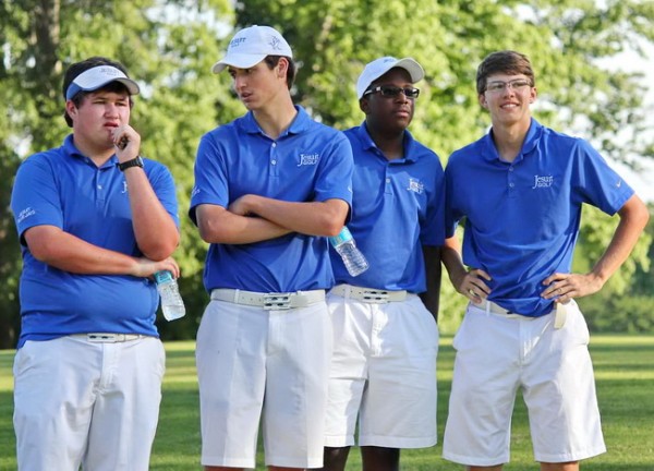 Looking over the scores posted on the first day of the state tournament in Shreveport are, from left, junior Will Dufour, senior Nick Ingles, junior C.J. Blagrove, and senior Jack Culotta, the team’s alternate. If improvement is the measure of a successful season,  coach Owen Seiler should be proud of his Blue Jay golfers.