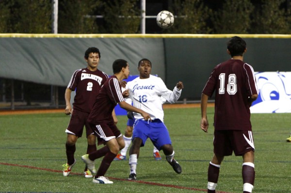 Junior forward Cameron Coulon fields the ball. Coulon scored in the  second half of the Blue Jays’ win over Chalmette.