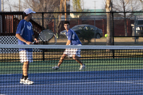 Seniors Tevor Lew (left) and James Sampognaro won their doubles match against Newman at UNO on Thursday, March 7.