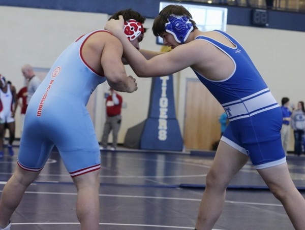 Sophomore Dom Carmello (220) competes against a Rummel Raider at the City Championship at Holy Cross High School.