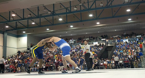 Zachary Creel wrestles Payton Holmes of Covington in the 285-pound weight class Friday, Feb. 15, 2013, during the state championship wrestling tournament at the Pontchartrain Center.