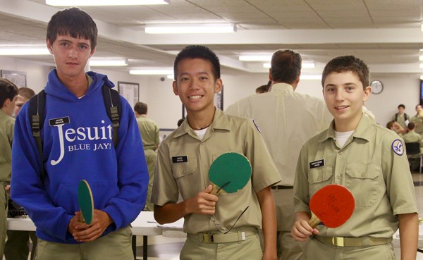 Then freshmen Jacob Niehaus, Andre Nguyen, and Christopher Abadie recruit for the Ping Pong Club during the 2012-2013 Rush Days.