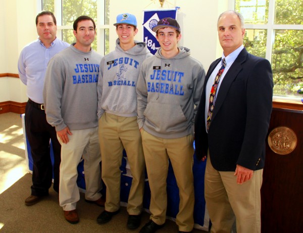 Statistician Jeff Chapuis, assistant coach Kenny Goodlet, seniors Brandon Sequeria and Blake Baker, and head coach Joey Latino are pleased that Brandon and Blake will continue their baseballs careers in college and in New Orleans.