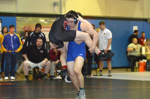 Sophomore Guy Patron (pictured here in the semi-finals match against Ethan Eisenhardt of Fontainebleau High) helped lead the Jays with an individual title after dominant performance in the 184-pound class.
