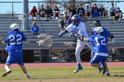 In traffice, freshman Parker Simoneaux shoots against the Mandeville Skippers on Saturday, Feb. 15.