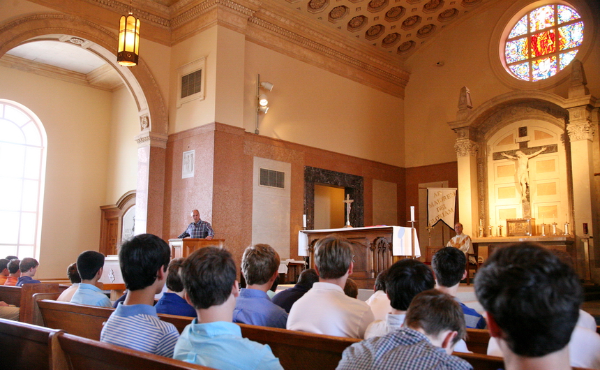 Head baseball coach Joey Latino addresses varsity and pre-freshmen players at a special Mass held Saturday, Feb. 22 in the Chapel of the North American Martyrs.