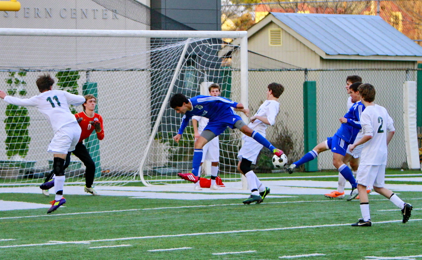Evan Kamer places a corner kick in precisely the right place. Jack LaForge (middle) misses heading the ball into the Greenie's goal, but Mitch Bourgeois is in the right place at the right time. He unleashes a kick that flys by Newman's goalie to give the Jays a 1-0 lead, and eventually, the win.