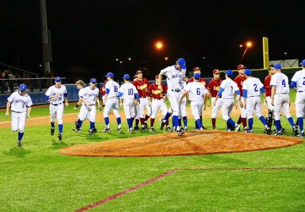 The Blue Jays and Crusaders meet on the field after their second district game in 2013 at John Ryan Stadium. The Jays dropped both games to Brother Martin last year, 8-1 and 6-3.