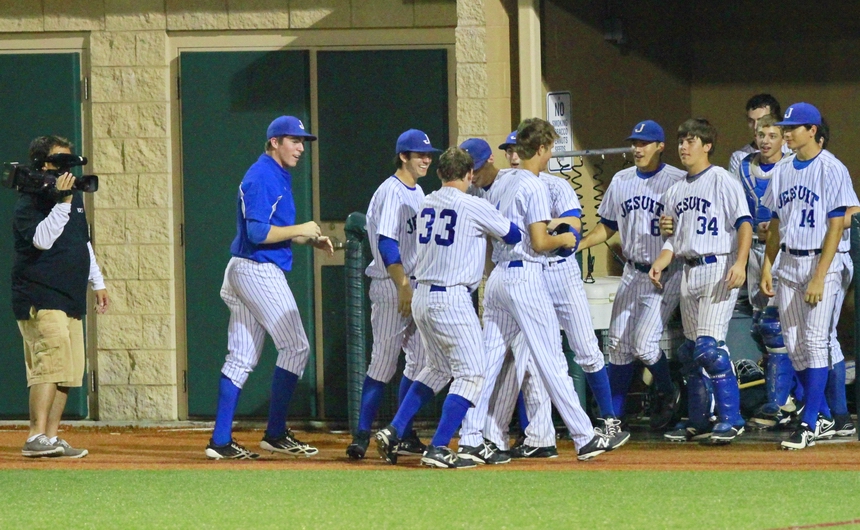 Jesuit catcher Trent Forshag (33) hit a huge double with the bases loaded when the Jays beat Central of Baton Rouge, 7-4, last Tuesday, April 29. Forshag had a courtesy runner come in and returned to the  dugout where his exuberant teammates threw down the welcome mat.