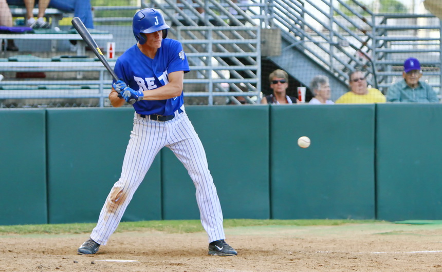 Nick Ray takes a strike in Retif Oil's game against Otto Candies in the S.E. Regional Tournament. Ray, who has played at 3rd base, shortstop, and center field, singled at this at-bat.