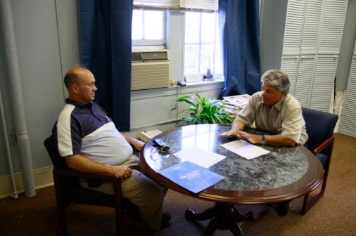 Pensacola resident Mike Waldo '70 meets with alumni director Mat Grau '68 about forming an official alumni chapter in the Pensacola-Mobile area.