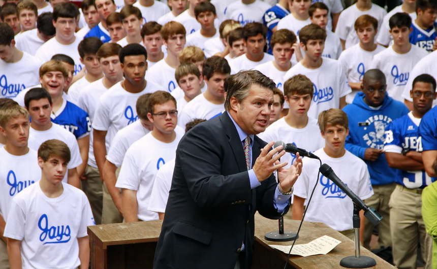 At morning assembly on Friday, Sept. 6,  PAG chairman Gerald Duhon '85 tells students that the Parents' Annual Giving drive is what helps to keep Jesuit... Jesuit.
