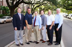 PAG chairman Gerald Duhon '85 joins tri-chairs Skip Crabtree, Eric Derbes '83. Rene Alvarez '83, Mike Varisco '83, and Tony Toups '81 on the Banks Street neutral ground to pick up last-minute pledge cards. 