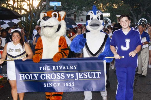 Holy Cross's Thunder and Jesuit's Jayson lead the 2014 Great American Rivalry Parade prior to the 95th meeting of Jesuit and Holy Cross on Friday, Oct. 10, 2014.