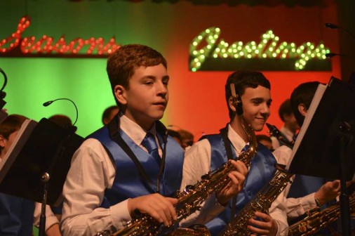 Jazz band members wait for their next cue during the 2014 Christmas Concert.