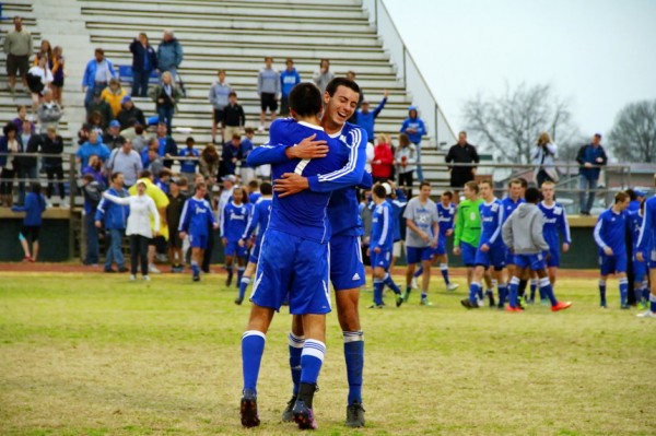 Chase Rushing (7) and Jack LaForge embrace following the Jays' stunning 4-3 comeback win against the Acadiana Rams.