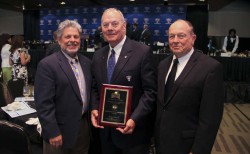 National Football Foundation 2015 Distinguished American Jack Laborde '67 with alumni director Mat Grau '68 and Bro. William Dardis, S.J. '58