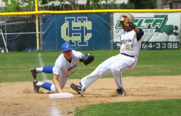Nick Ray lunges toward a Tiger runner in an unsuccessful attempt to tag him out at 3B.