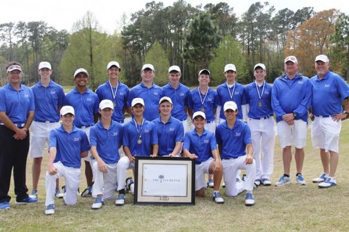 Members of the 2014-15 Jesuit golf team, who finished third at The Palmetto High School Tournament in Myrtle Beach, South Carolina. From left are Monty Glorioso (father), Cameron Kaupp, Carlo Carino, Grant Glorioso, Johnny Cedro, Jack Vollenweider, Nolan Lambert, J.T. Holmes, Sean Donovan, Doug Lambert (father), and head coach Owen Seiler '75. On the front row are Andrew Kuebel, Brett Hocke, Grayson Glorioso, Jake Kuebel, and Colin Hery. 