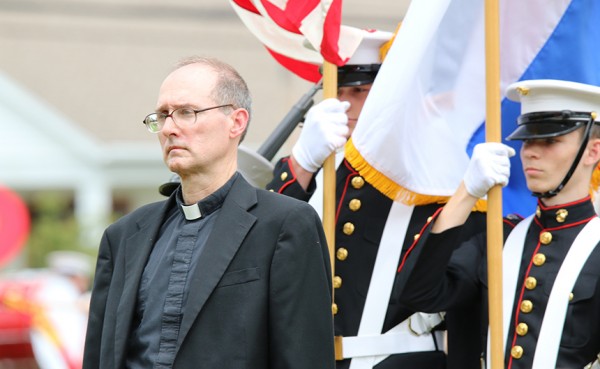 Fr. Raymond Fitzgerald, S.J. ’76 was the guest of honor at the annual MCJROTC Parade and Review on Thursday, April 9, 2015. Photo courtesy of Ms. Jennifer Buuck.