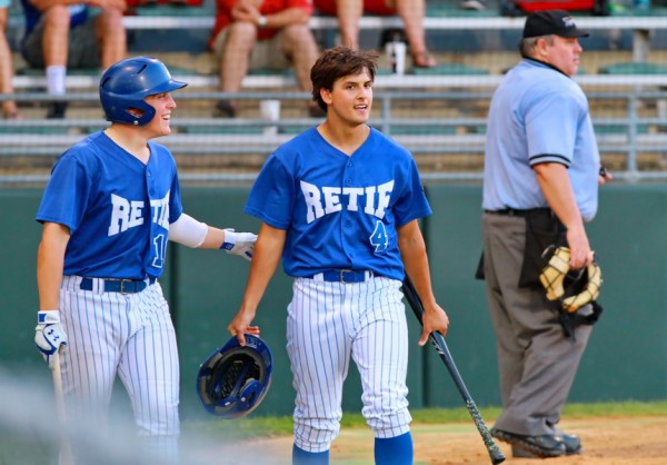 Dan Edmund (left) congratulates shortstop Alex Galy whose run in the bottom of the sixth gave Retif a 5-1 lead. Unfortunately, the lead went up in smoke as Peake came to life in the last inning.