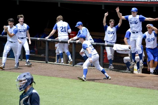Retif players celebrate as Harrison Daste's grounder scores Josh Josh Schmidt with the walk-off run in the bottom of the seventh inning against Gauthier & Amedee in the semifinal