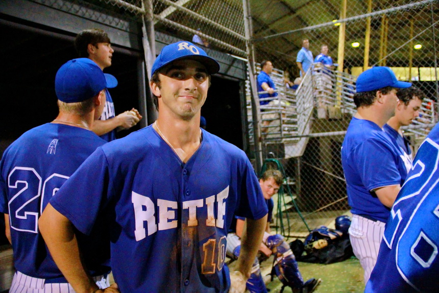 Ben Hess is all smiles in the dugout after coming up with a timely big hit to help the Oilers beat Gauthier-Amedee.