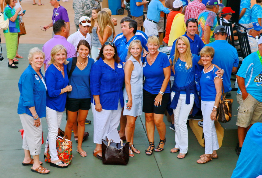 This group of mothers and grandmothers (with one notable exception) is among the most enthusiastic supporters of Jesuit and American Legion baseball. They rarely have missed watching their sons play ball. From left are Brenda Connolly, grandmother of Scott and Todd Crabtree and mother of Breni Crabtree ( third from right); Renee Melito, grandmother of Ben Hess and mother of Lorraine Hess (second from right); Julia Gerarve, girlfriend of Ben Hess; Rebecca Edmund, mother of Dan Edmund; Anne Beebe, mother of Mark Beebe; Breni Crabtree, and Lorraine Hess with her mother-in-law Tish Hess, who is the mother of Rob Hess '85 (standing behind Lorraine).