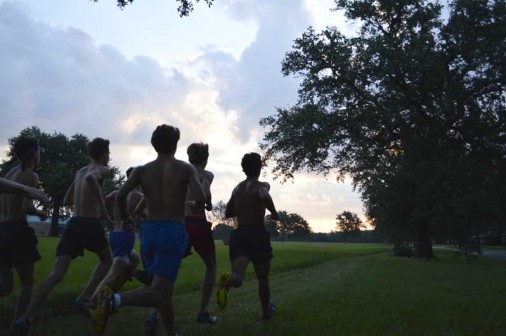 Cross country runners take to the old UNO Lakefront course for the annual Red, White & Blue intrasquad run as the sun rises on August 29.