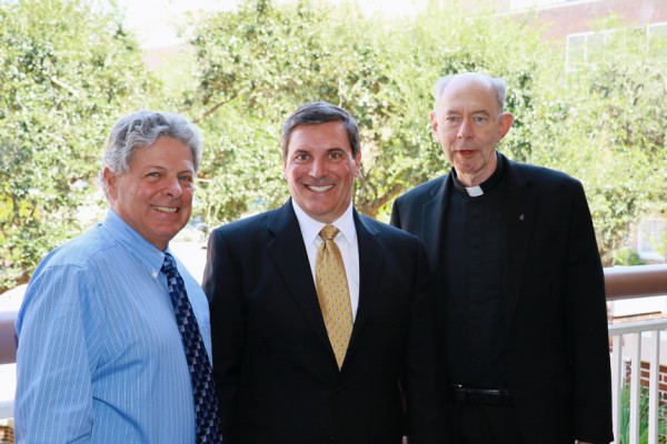 John E. O'Shea with alumni director Mat Grau '68 and Fr. McGinn. O'Shea will be the 58th alumnus to receive the F. Edward Hebert Award at the Homecoming Mass on Saturday, September 26 at 5 p.m. in the Chapel of the North American Martyrs.