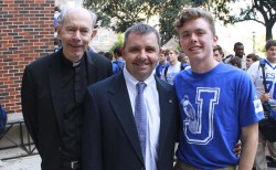 Fr. Anthony McGinn, S.J., Philip Nimmo, and his son, John '16, who introduced his father.