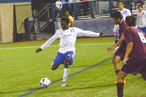 Senior Charles Rice lines up Jesuit's third goal of the evening.