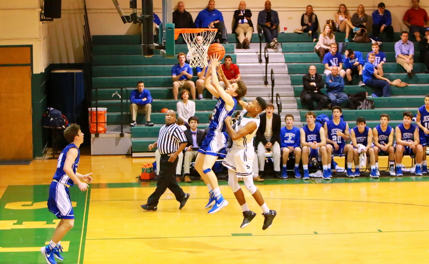Chris Beebe is fouled on this rebound layup against Shaw last Friday.