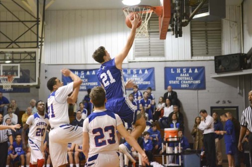 Junior Sam Ovella soars for two of his seven points in Jesuit's upset of John Curtis on Tuesday, Jan. 12. Ovella also pulled down a team-high seven rebounds.