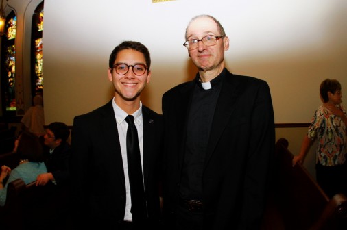 John Guerra '14 with Fr. Raymond Fitzgerald, S.J. '76 at a donor reception in May 2015 for the renovated small chapel.
