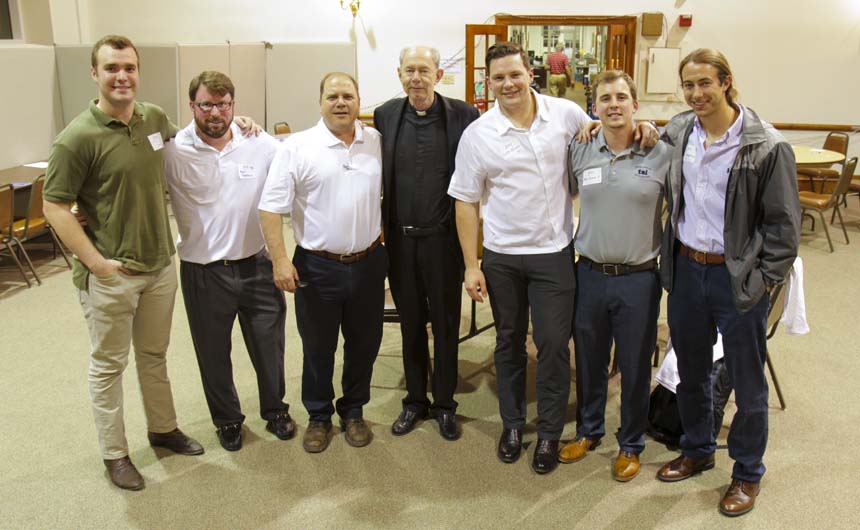 Grant Leger '11, 2015-16 LEF chairman Marc Bonifacic '92, 2014-15 LEF chair Mike Varisco '83, Fr. Anthony McGinn, S.J. '66, Luke Voiron '11, Mike Firmin '11, and Jay Napolitano '11 celebrate a successful evening of connecting with classmates in St. Ignatius Hall.