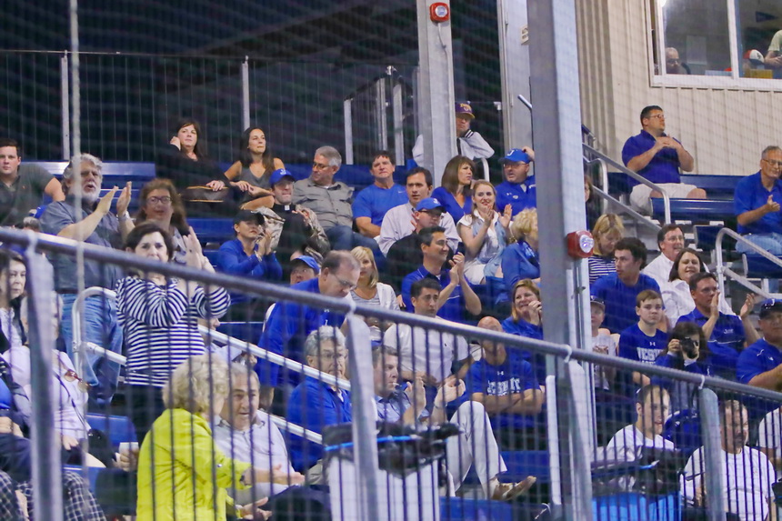 Some of the Blue Jay faithful in the grandstand cheer after Mark Beebe's single scores Stephen Sepcich, giving Jesuit a 1-0 lead that turned into a 1-0 win.