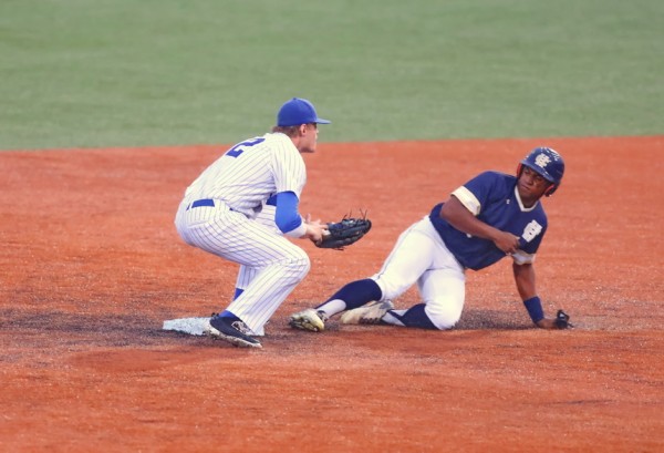 Nick Ray made a good effort to tag this Tiger who safely stole second base.