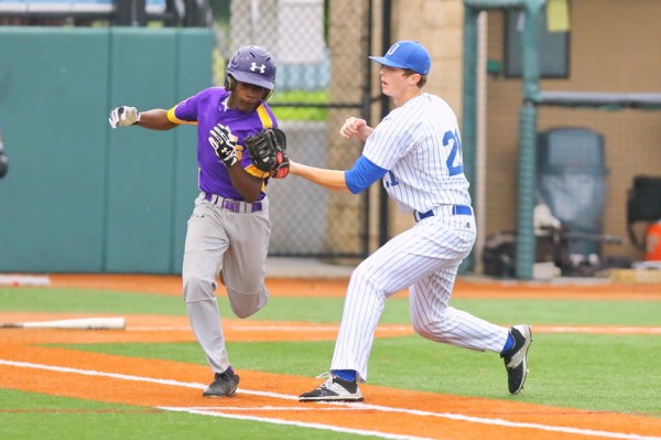 First baseman Jake Licciardi made a big out by charging the bunt and tagging this St. Aug batter on the first base line.