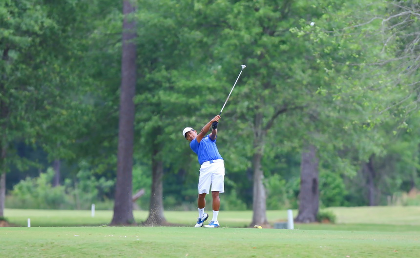 Carlo Carino tees off in the regional tournament  held at Carter Plantation on Tuesday. 
