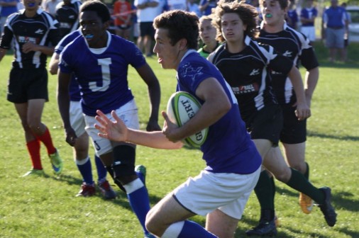 Junior Jack Gab is off and running on his way to score a try for the Blue Jays.