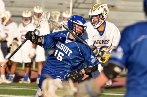 Senior attacker Max Murret, who tallied four goals and three assists in the game, drives through a defender.